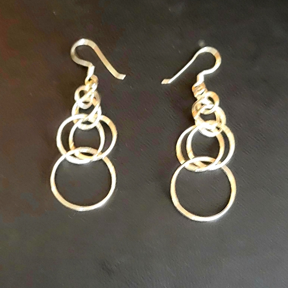 Sterling silver dangling ring earrings